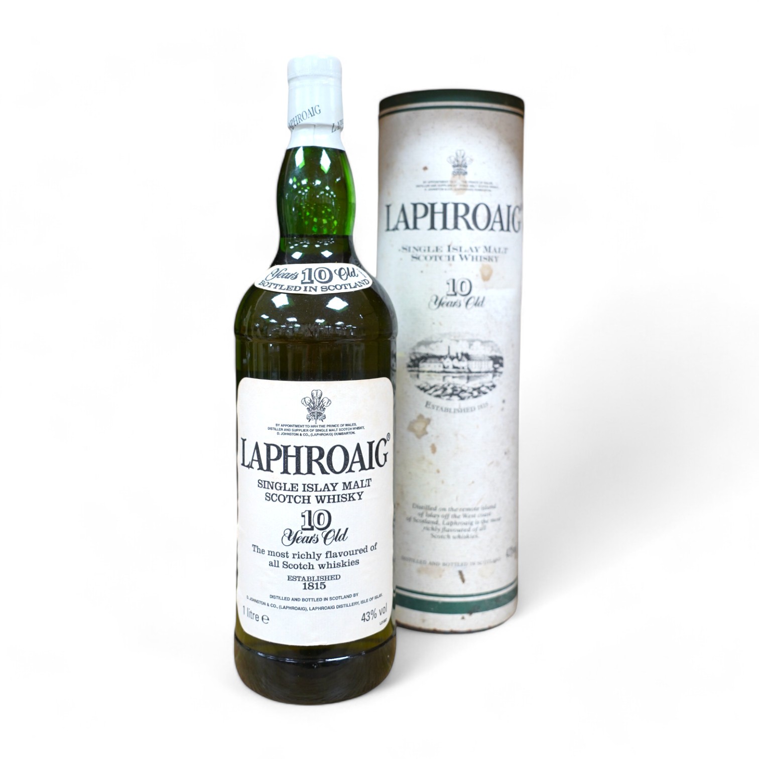 A cased 1lt bottle of Laphroaig Single Islay Malt Scotch Whisky, 10 Years Old. Condition - good, some staining to case